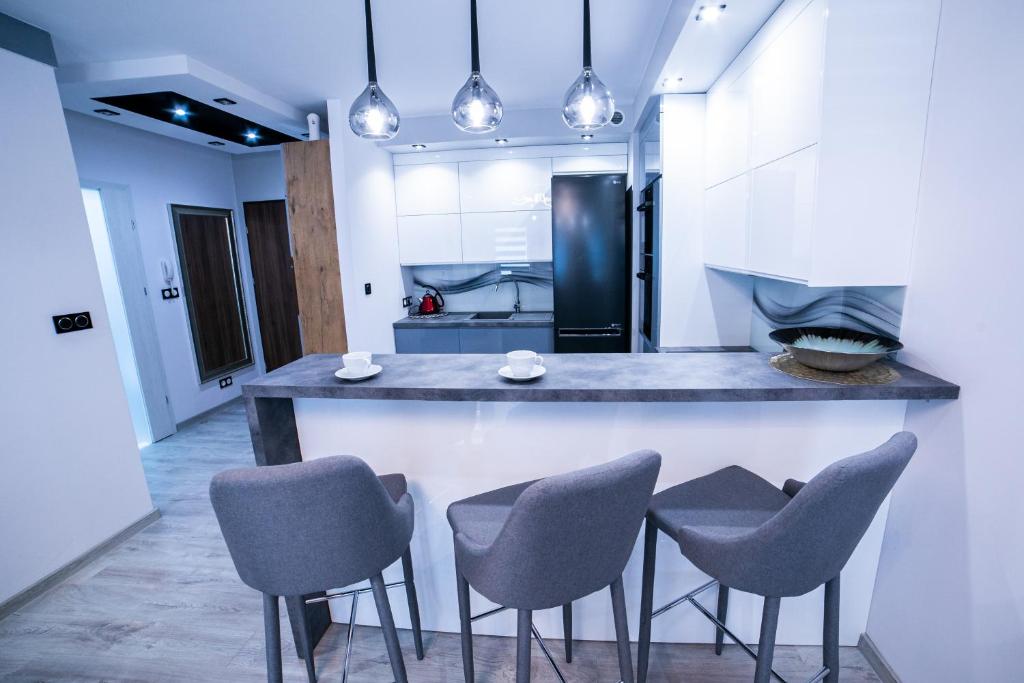 Kuchyňa alebo kuchynka v ubytovaní Markiz Apartments