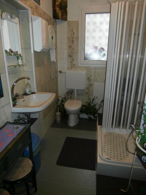 Koupelna v ubytování Albergo Junior