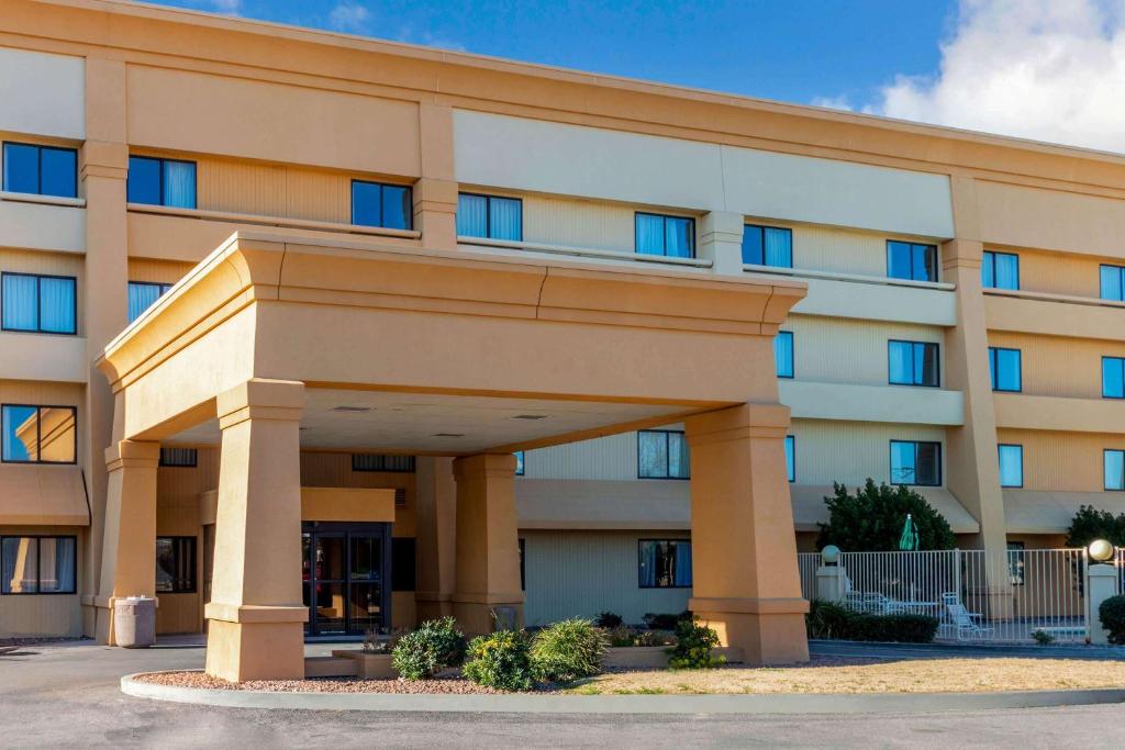 a large office building with a large building at La Quinta Inn & Suites by Wyndham Las Cruces Organ Mountain in Las Cruces