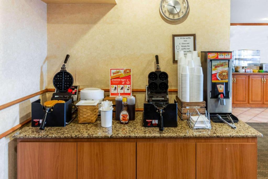 a counter in a kitchen with a counter top with food at La Quinta Inn & Suites by Wyndham Las Cruces Organ Mountain in Las Cruces