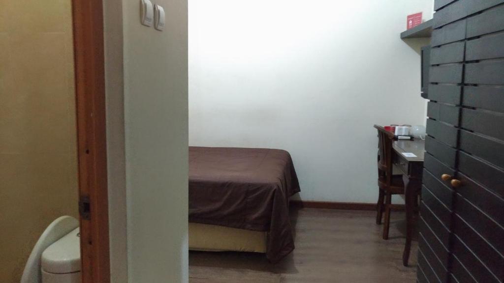 Postel nebo postele na pokoji v ubytování Casa Vanda Guesthouse