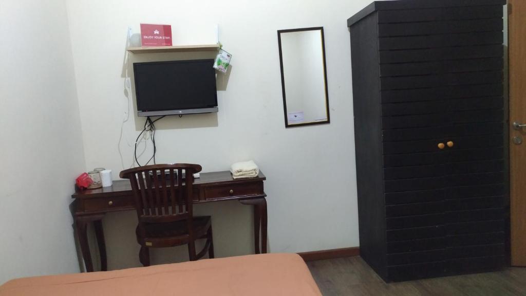 TV a/nebo společenská místnost v ubytování Casa Vanda Guesthouse