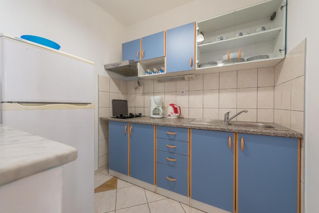 Kuchyňa alebo kuchynka v ubytovaní Lavanda Apartment