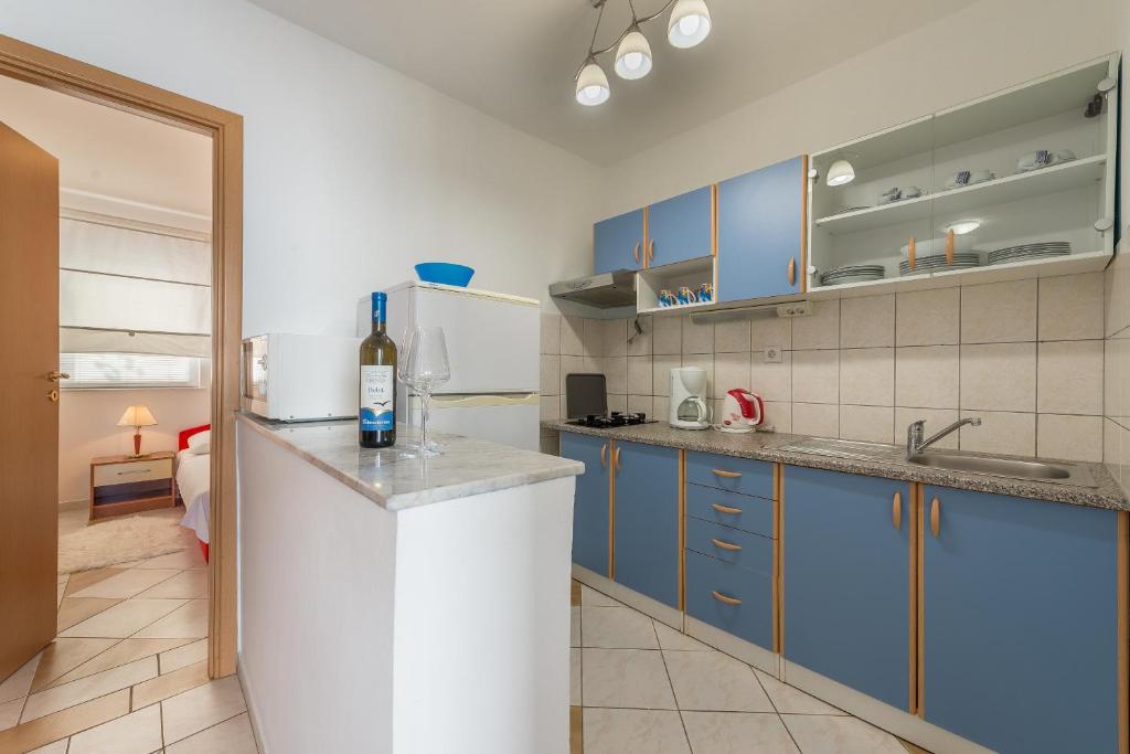 Kuchyňa alebo kuchynka v ubytovaní Lavanda Apartment