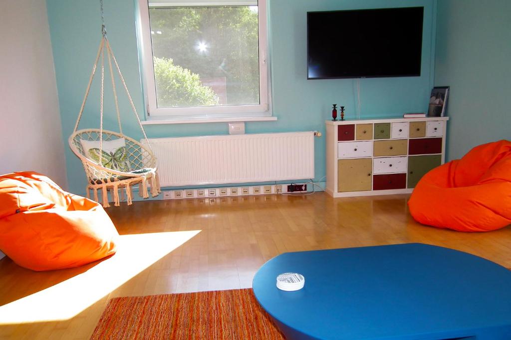 TV a/nebo společenská místnost v ubytování Baker's Pond Apartment Two