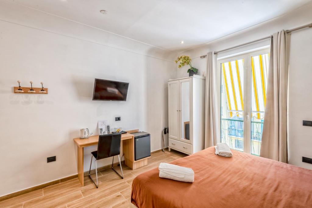 Postel nebo postele na pokoji v ubytování B&B Giacomino