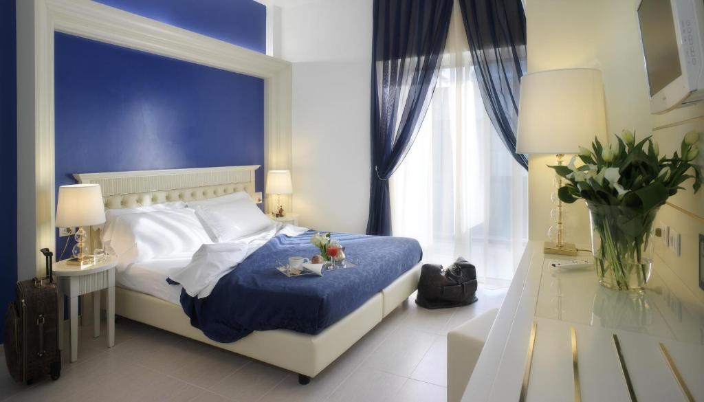 Postel nebo postele na pokoji v ubytování Hotel Feldberg