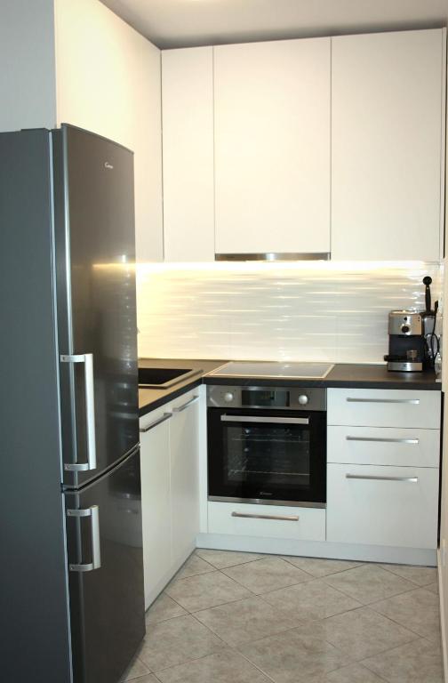 Kuchnia lub aneks kuchenny w obiekcie Sunwell apartments - Novalja, Gajac, Zrće