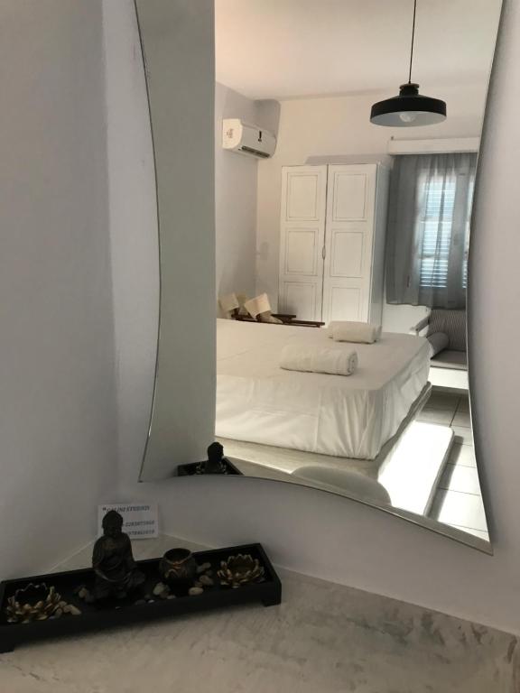 Postel nebo postele na pokoji v ubytování Galini Studios
