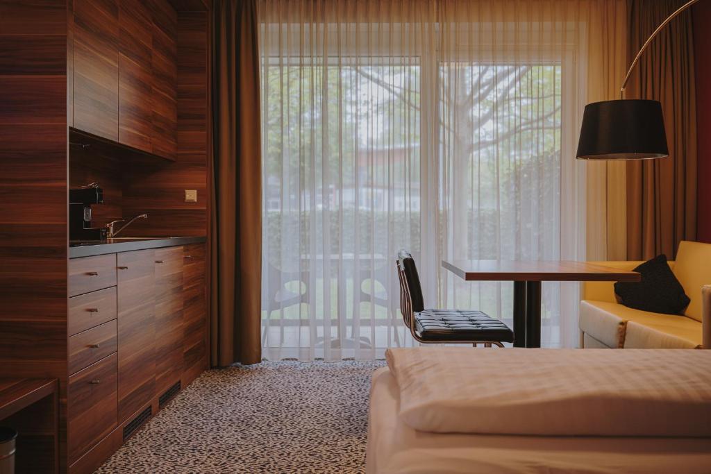 Voodi või voodid majutusasutuse Hotel Süd Graz toas