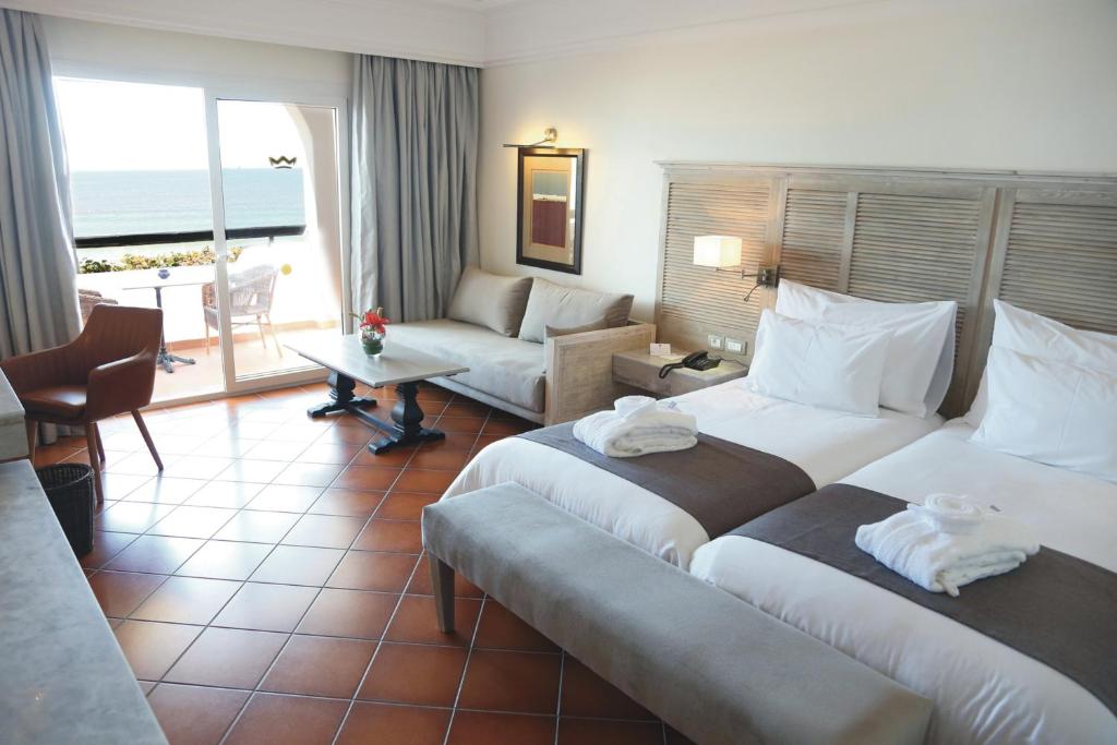Postel nebo postele na pokoji v ubytování Hotel Riu Tikida Beach - Adults Only - All inclusive