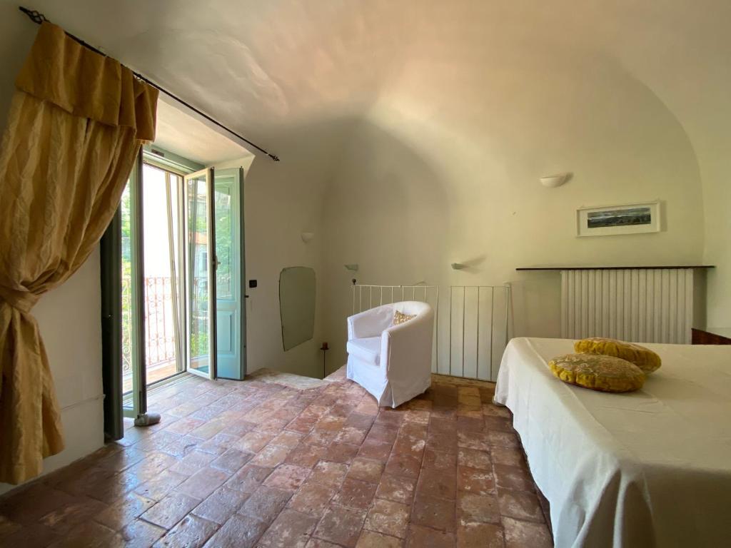 Postel nebo postele na pokoji v ubytování Fisolare Suite romantica per due