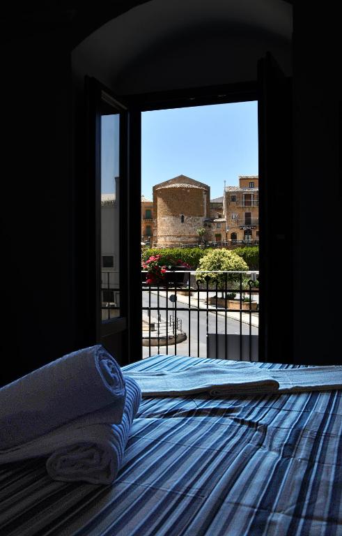 Posteľ alebo postele v izbe v ubytovaní B&B AURORA