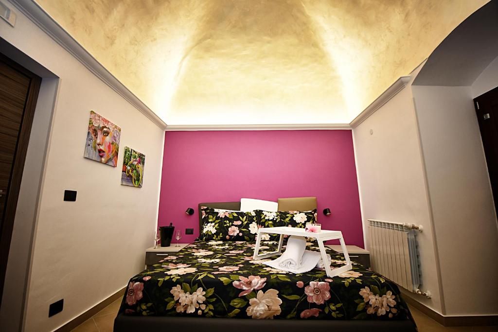 Posteľ alebo postele v izbe v ubytovaní B&B AURORA