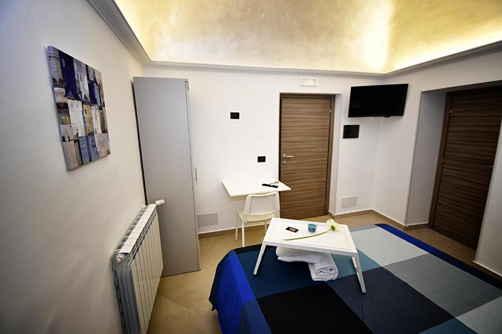 Posteľ alebo postele v izbe v ubytovaní B&B AURORA