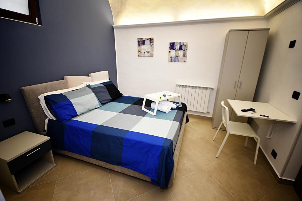 Posteľ alebo postele v izbe v ubytovaní B&B AURORA