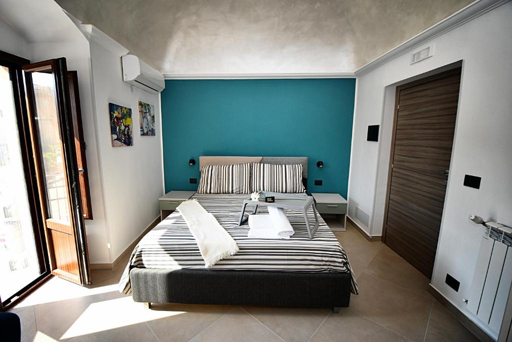 Posteľ alebo postele v izbe v ubytovaní B&B AURORA