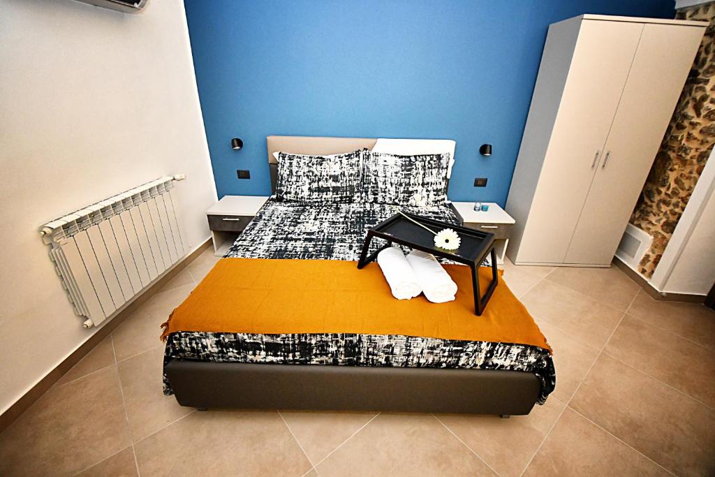 Posteľ alebo postele v izbe v ubytovaní B&B AURORA