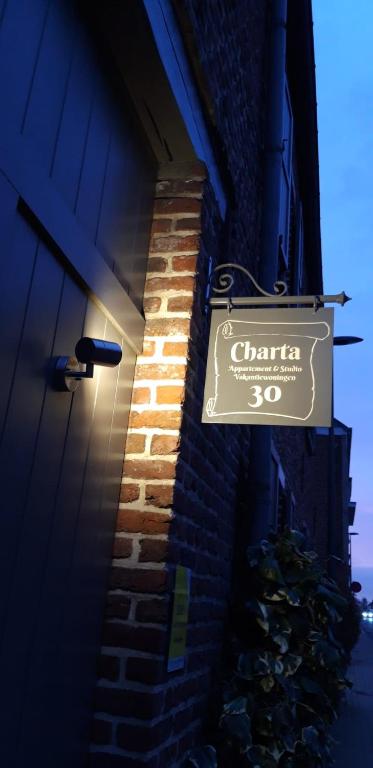 Certifikát, hodnocení, plakát nebo jiný dokument vystavený v ubytování Charta Appartement