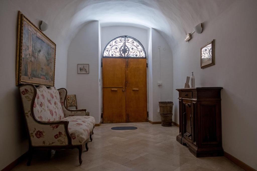 Posezení v ubytování Città Di Castello Rooms