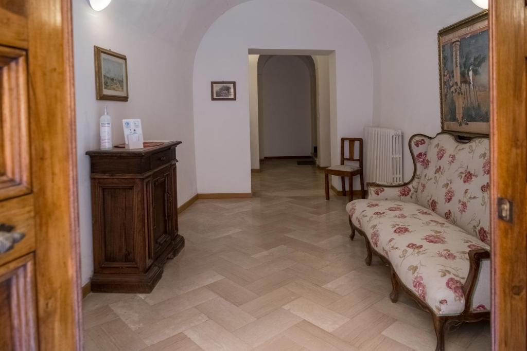 Posezení v ubytování Città Di Castello Rooms