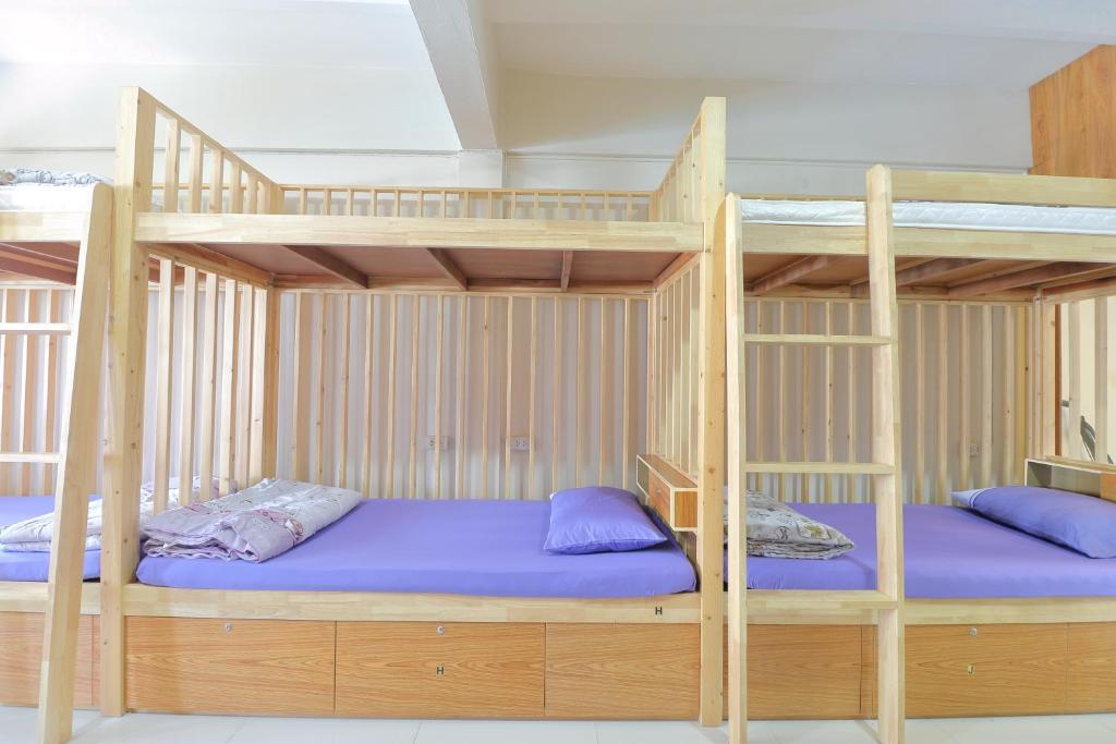Postel nebo postele na pokoji v ubytování Saen Sabai Hostel