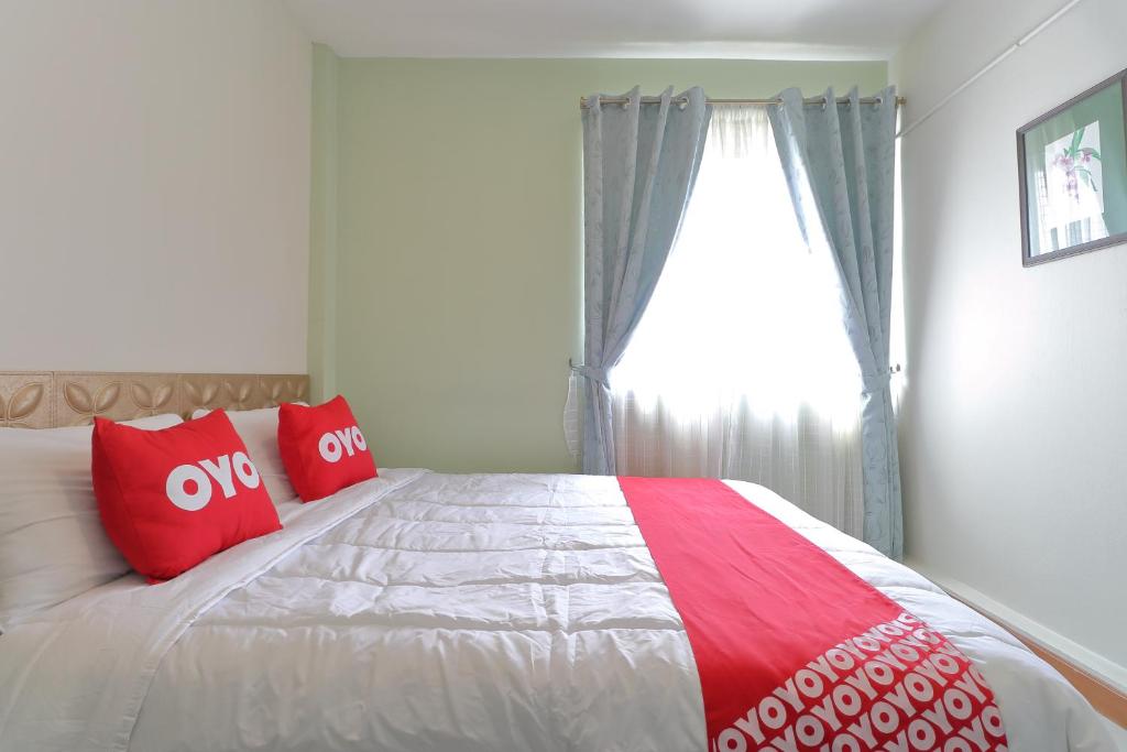 Postel nebo postele na pokoji v ubytování Saen Sabai Hostel