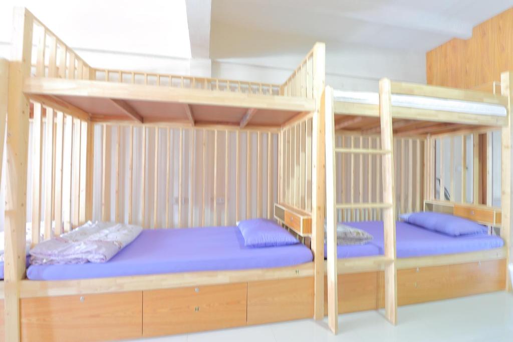 Postel nebo postele na pokoji v ubytování Saen Sabai Hostel