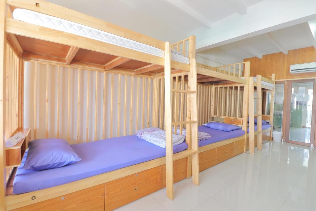 Postel nebo postele na pokoji v ubytování Saen Sabai Hostel