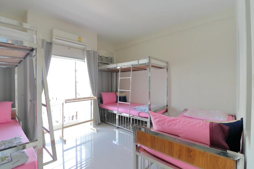 Postel nebo postele na pokoji v ubytování Saen Sabai Hostel
