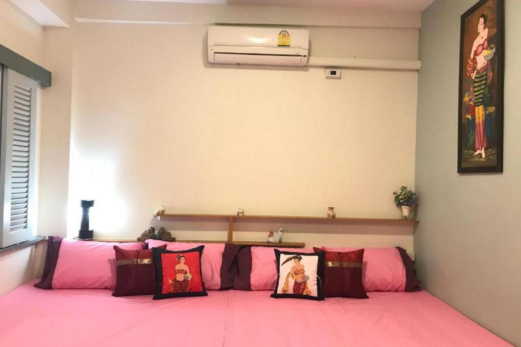 Postel nebo postele na pokoji v ubytování Saen Sabai Hostel