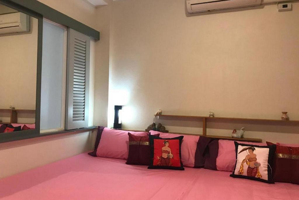 Postel nebo postele na pokoji v ubytování Saen Sabai Hostel