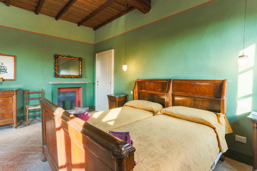 Postel nebo postele na pokoji v ubytování AGRITURISMO LE CORTI DELLA GUALDANA