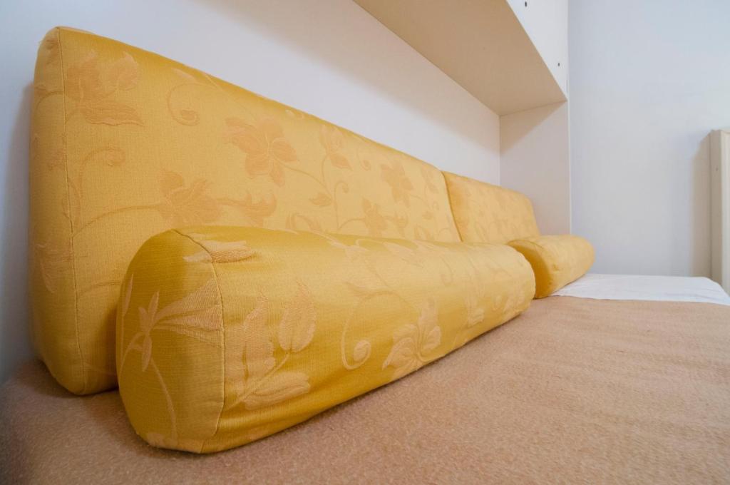 Postel nebo postele na pokoji v ubytování Albergo ai Tolentini