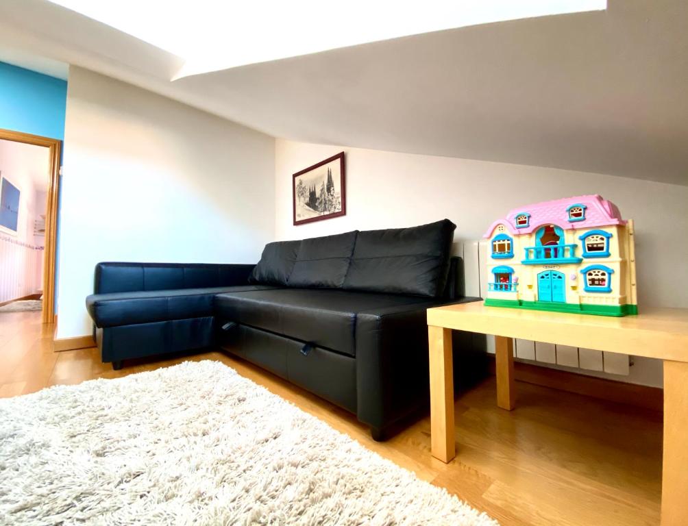 A seating area at Apartamento Turistico Plaza Mayor