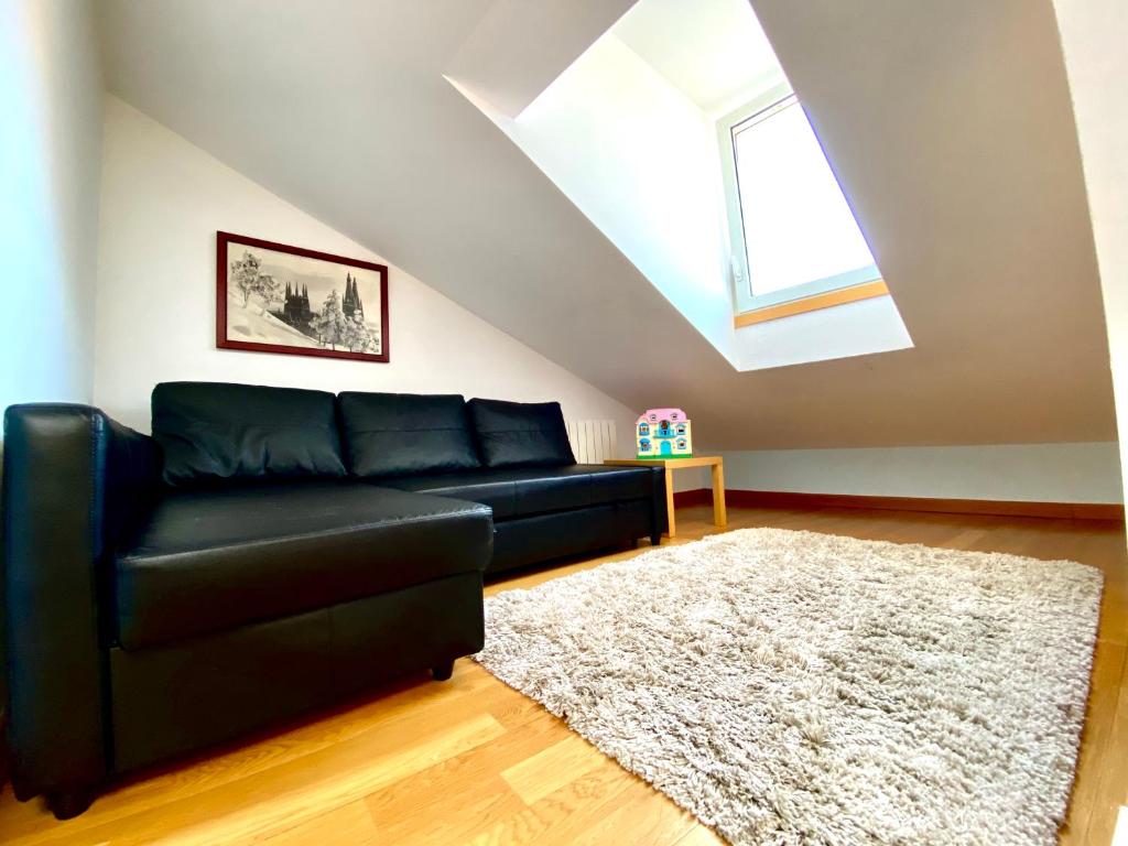 A seating area at Apartamento Turistico Plaza Mayor