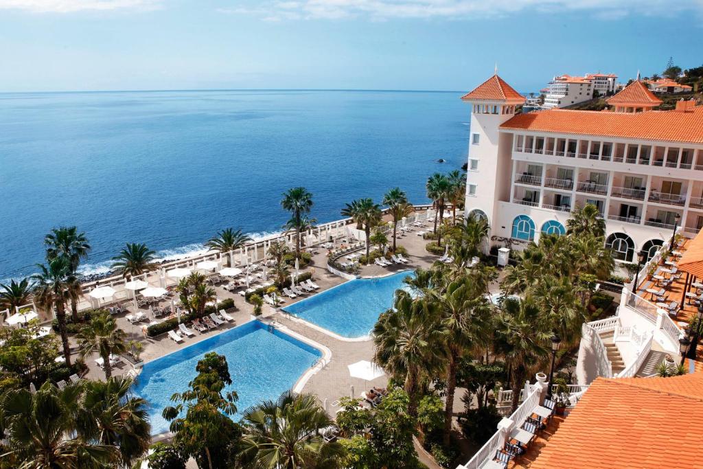 an aerial view of the resort and the ocean at Hotel Riu Madeira - All Inclusive in Caniço