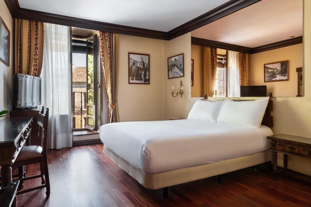 Un pat sau paturi într-o cameră la Crisol Conde Rodrigo