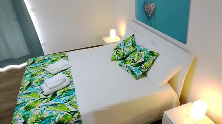 Postel nebo postele na pokoji v ubytování Salento b&b La Casa dei Nonni