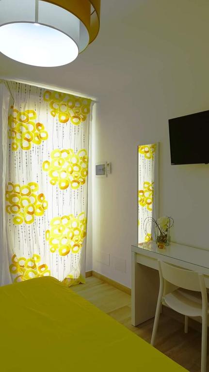 TV a/nebo společenská místnost v ubytování Salento b&b La Casa dei Nonni