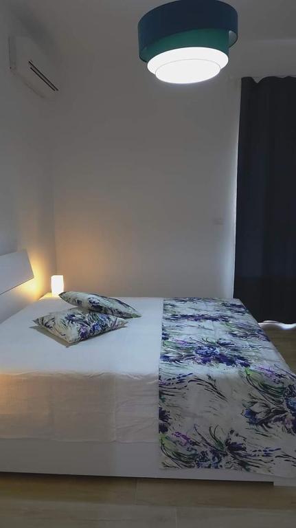 Postel nebo postele na pokoji v ubytování Salento b&b La Casa dei Nonni