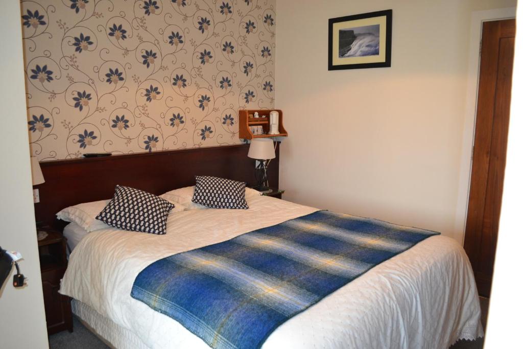 Postel nebo postele na pokoji v ubytování Churchfield B&B