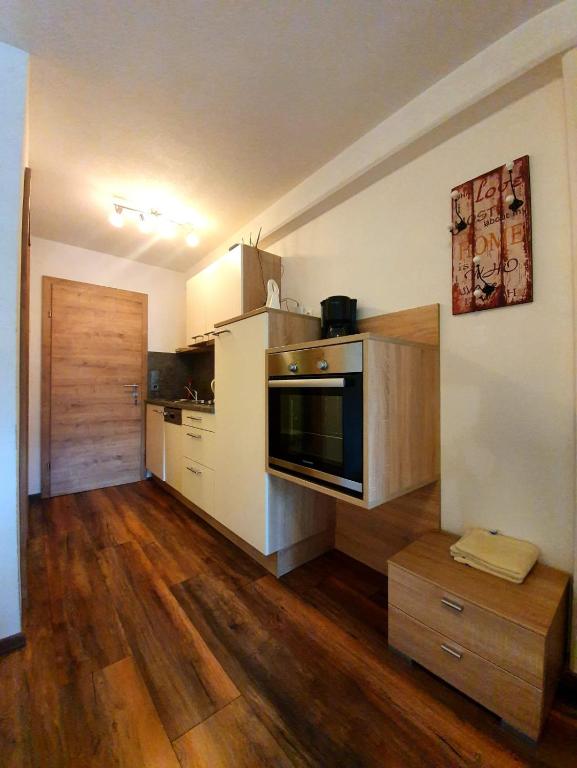 Kuchyň nebo kuchyňský kout v ubytování Gästehaus Flörl 1