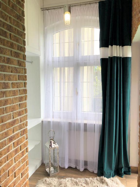 Fotografia z galérie ubytovania Kaliny Apartamenty wanny z hydromasażem v destinácii Chorzów