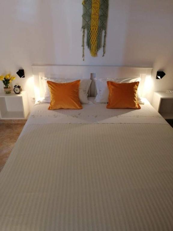 Postel nebo postele na pokoji v ubytování Apartmani Matiša