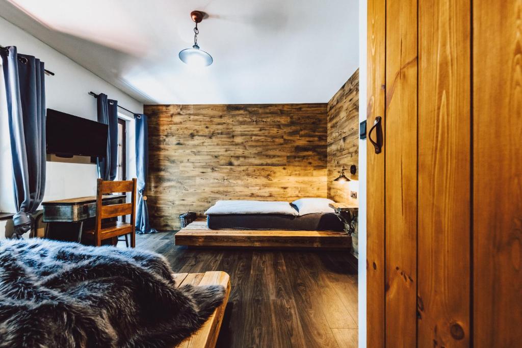 Postel nebo postele na pokoji v ubytování Resort Mlýn Černovice