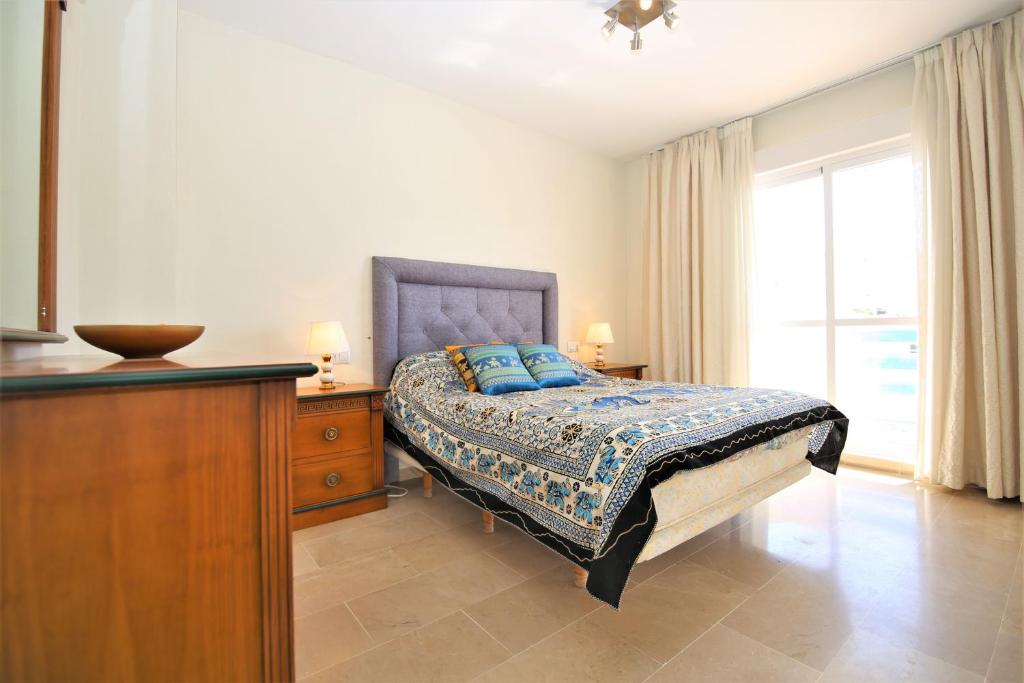 Posteľ alebo postele v izbe v ubytovaní Apartment BERNAL