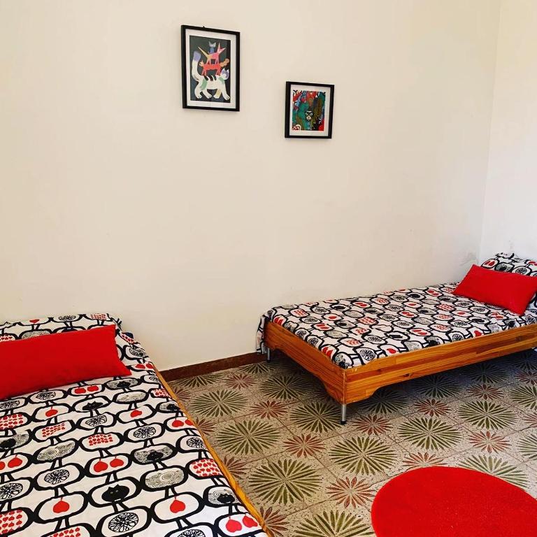 Postel nebo postele na pokoji v ubytování Casa Helenia Bruca