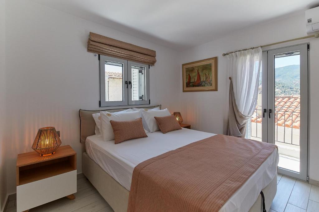 Postel nebo postele na pokoji v ubytování Euphoria House