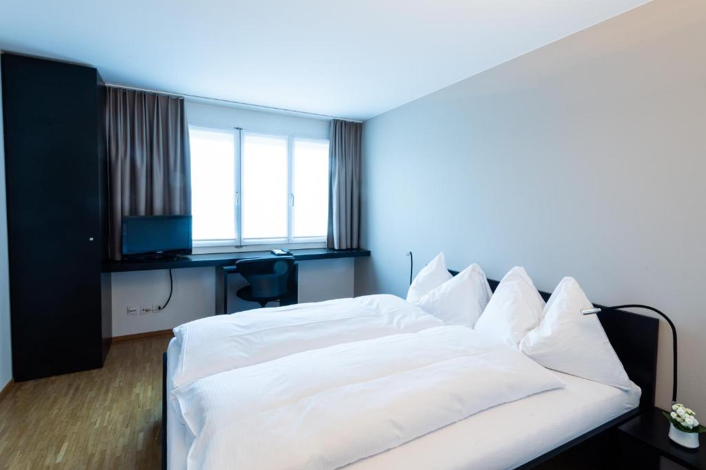 Postel nebo postele na pokoji v ubytování Hotel Bauernhof - Self Check-In Hotel